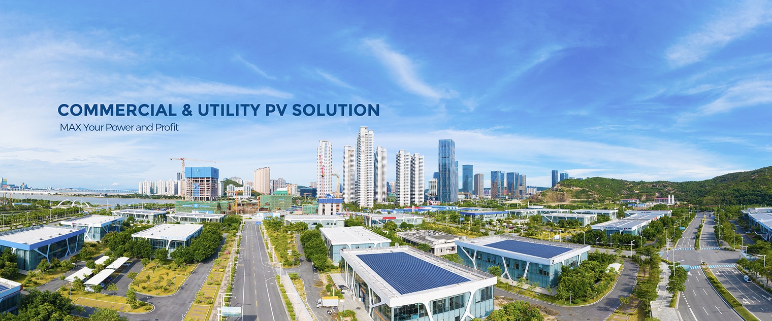 Commercial & Utility PV System, Panoramic view of a modern cityscape with skyscrapers and buildings with solar panels.